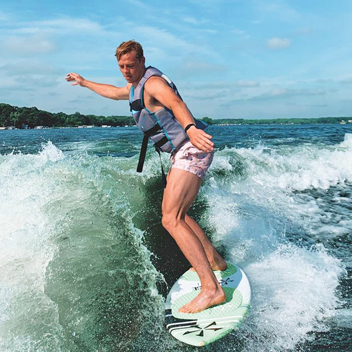 Sports to try out this summer wearing our swim trunks